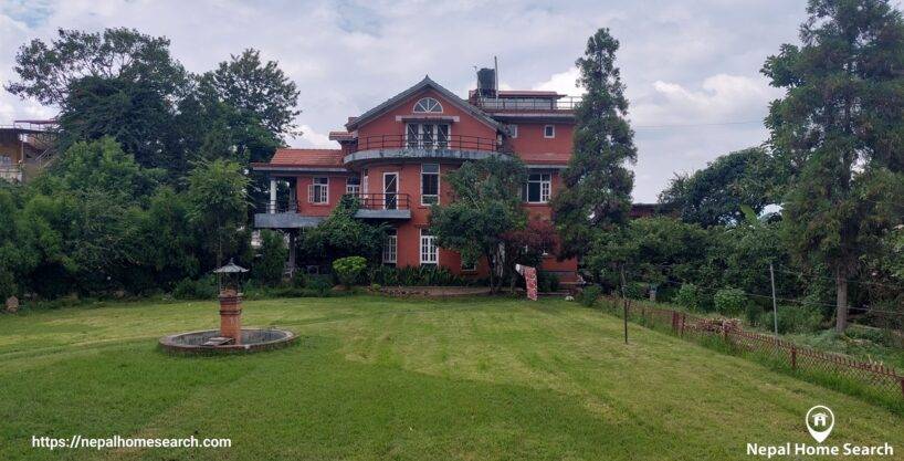 Vrindavan Villa Thaiba Lalitpur - A serene bungalow amidst lush greenery.